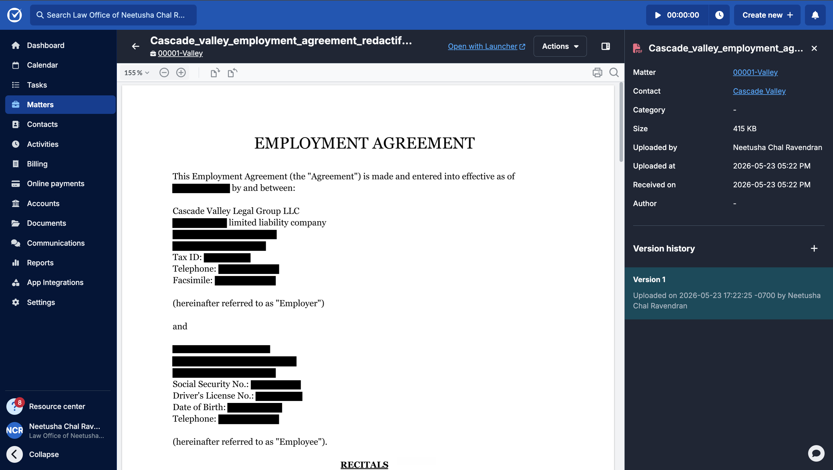 The redacted document open in Clio showing permanent black redactions